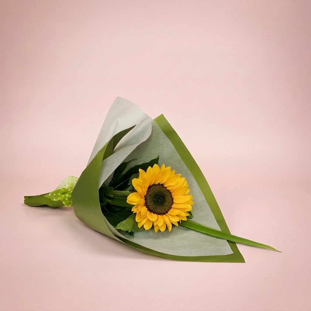 Single sunflower gift wrapped with foliage by Victoriana Florist Upper Hutt Main image