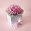 Florist choice flower arrangement in a container by Victoriana Florist
